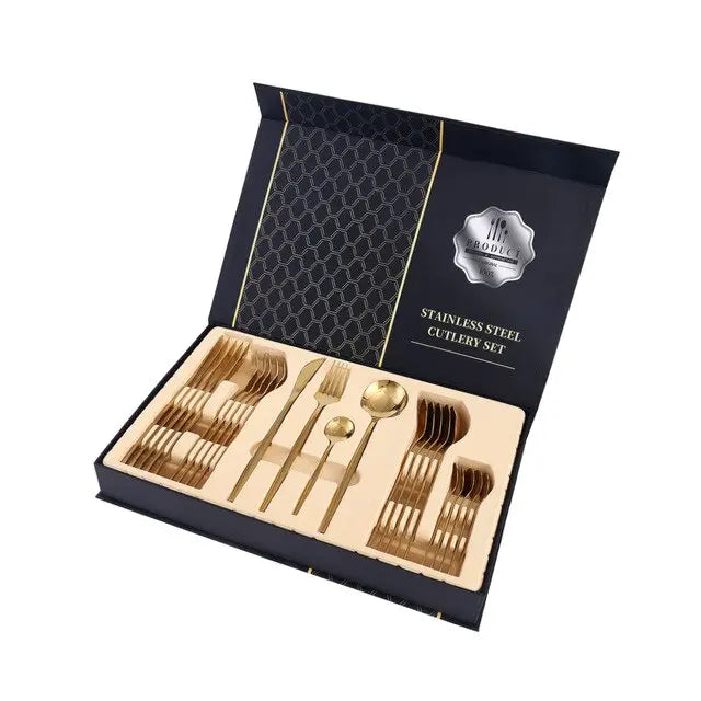 Gold stainless steel cutlery set in a black box with a brand logo.